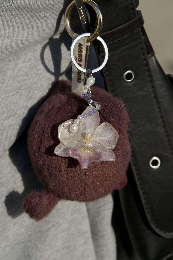 Porte-clés Perle mauve devant