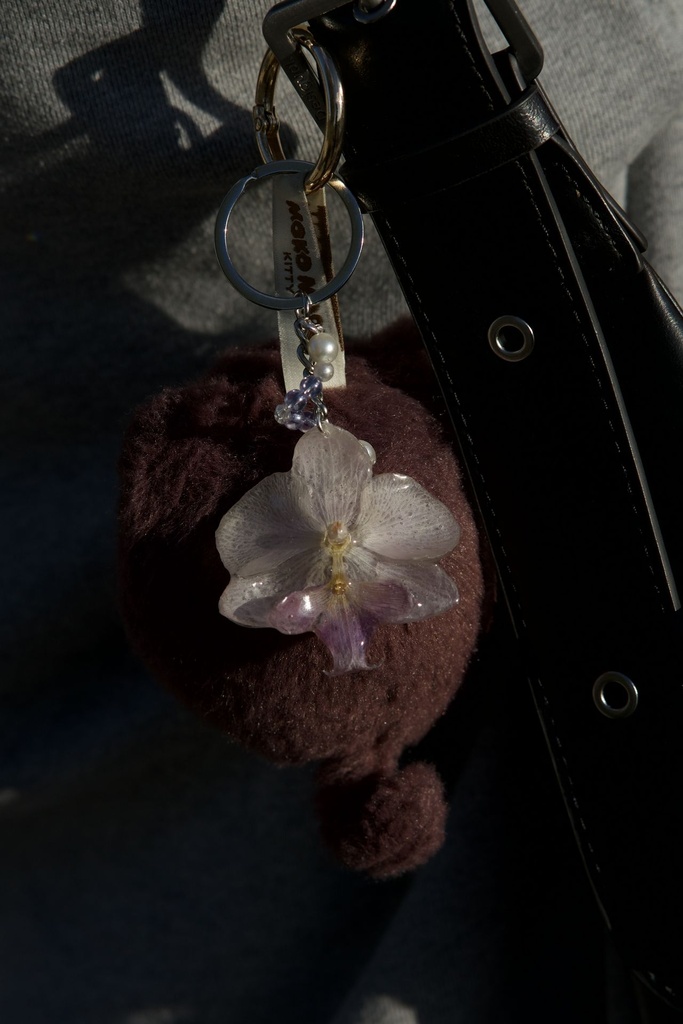 Porte-clés Perle mauve derrière